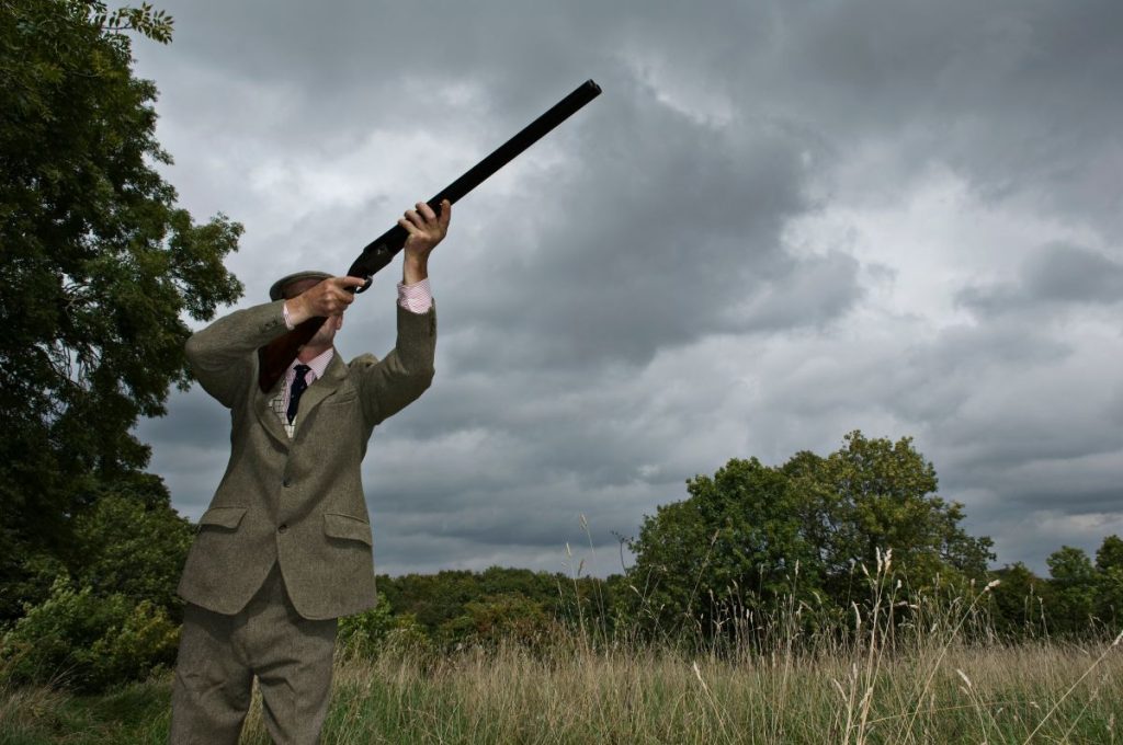 Country man with shot gun
